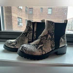 Never worn snakeskin boots.
